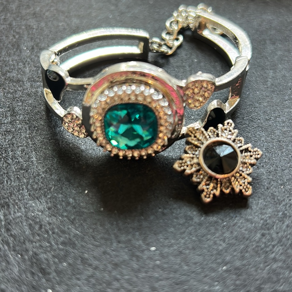 Elegant Silver and Black Bracelet and blue snap button.